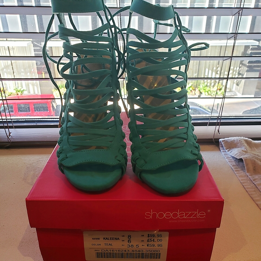 Teal strappy booties..